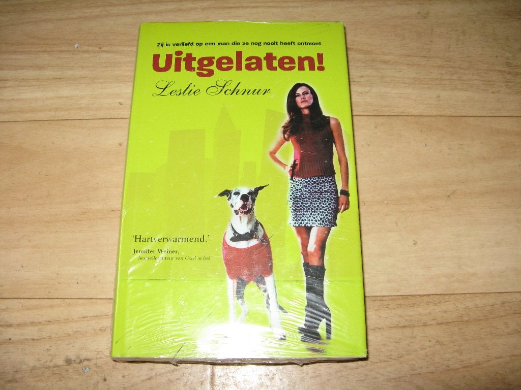 Leslie Schnur - Uitgelaten!, Boeken, Romans, Nieuw, Ophalen of Verzenden