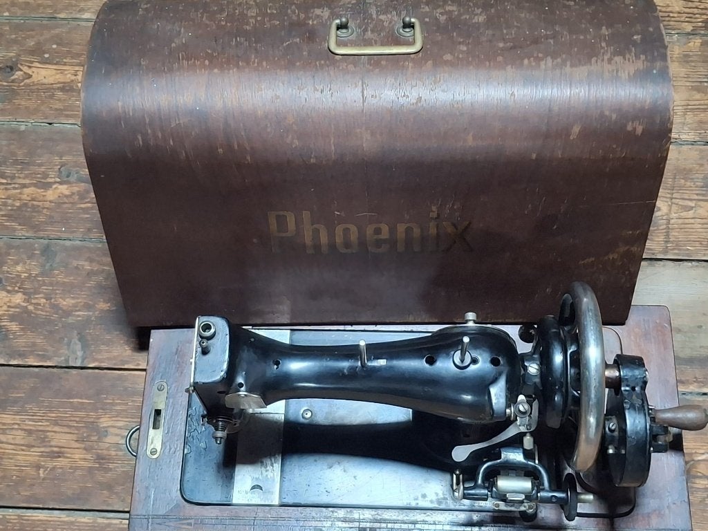 Phoenix naaimachine (verzamelaars-/decoratieobject), Ophalen