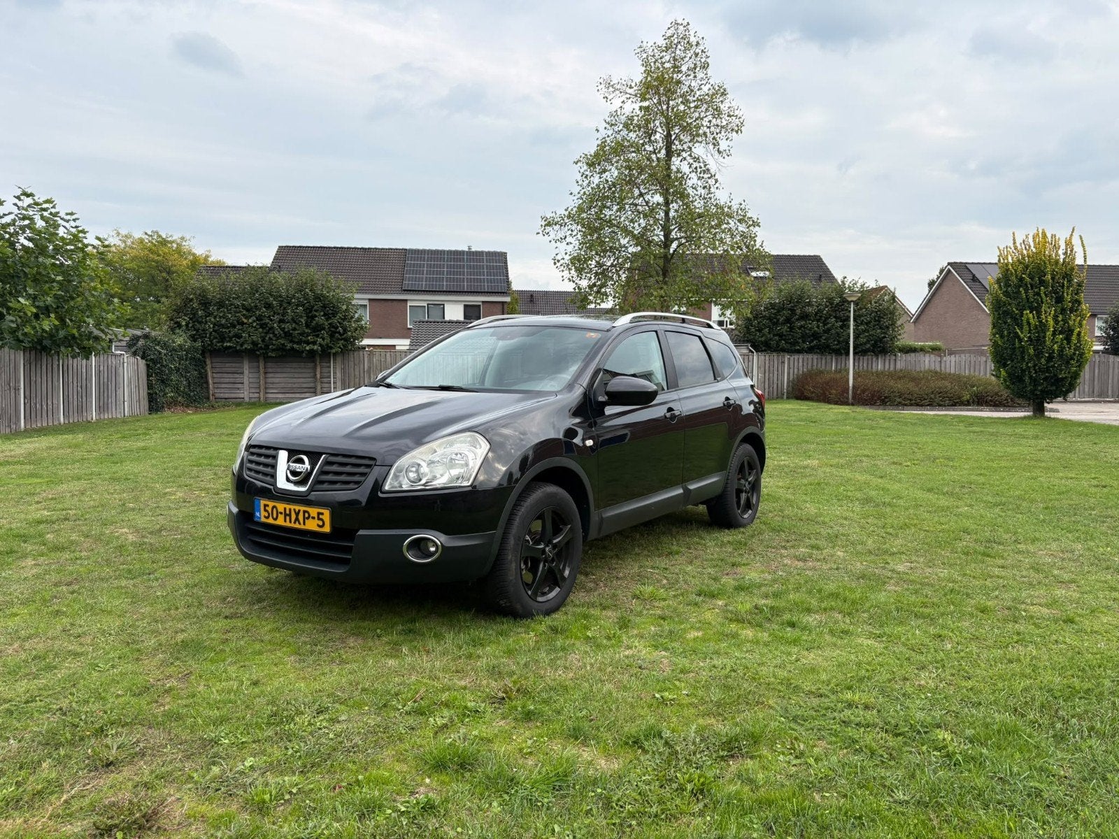 Nissan Qashqai+2 2.0 4WD 2009 Zwart, Auto's, Stof, 7 stoelen, Zwart, Origineel Nederlands