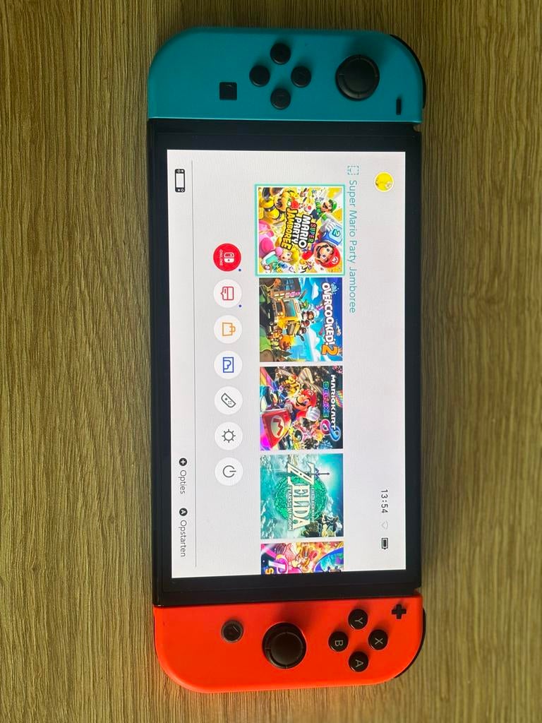 Nintendo Switch met Joy-Cons (Rood/Blauw), Spelcomputers en Games, Games | Nintendo Switch, Gebruikt, 1 speler, Vanaf 7 jaar, Ophalen of Verzenden