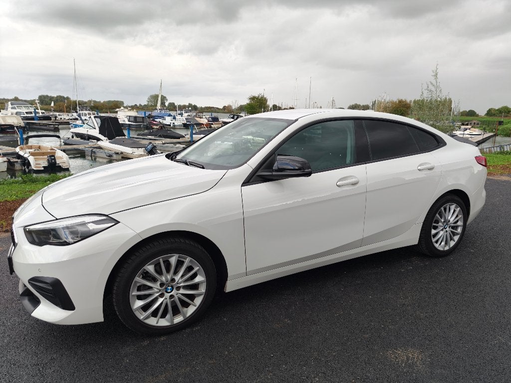 BMW 2-Serie Gran Coupé 218i 140pk Aut 2020 Wit, Auto's, Euro 6, 1350 kg, Overige bekleding, Wit