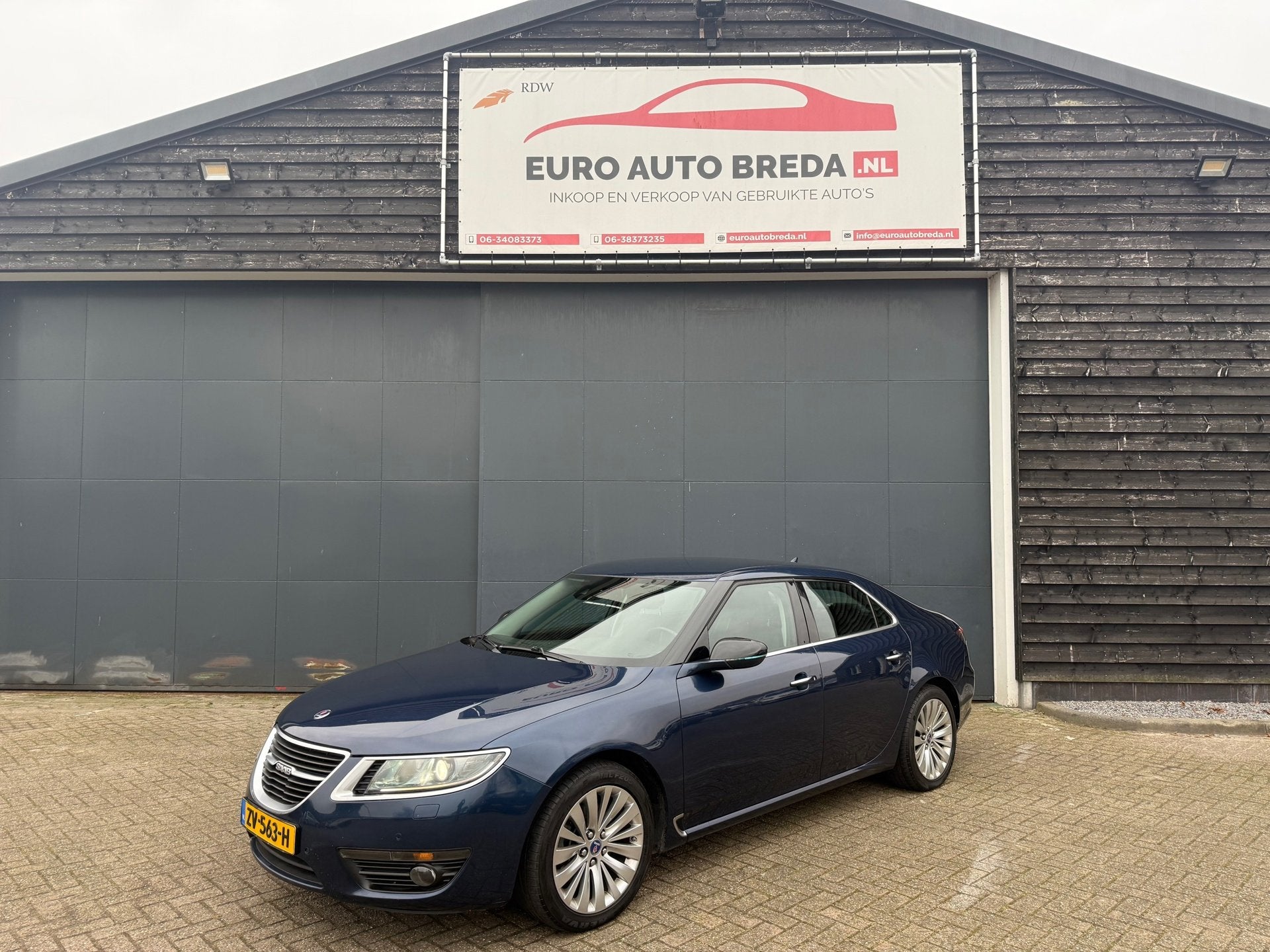 Saab 9-5 2.0 TiD Vector Exklusiv automaat, Auto's, Saab, Euro 5, 15 km/l, Blauw, Leder en Stof