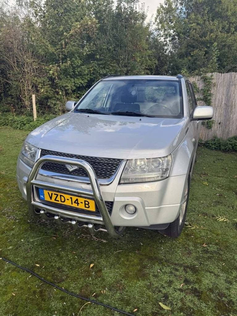 Suzuki Grand Vitara 1.9 D 2009 Grijs, Auto's, Stof, Zwart, 4 cilinders, Bedrijf