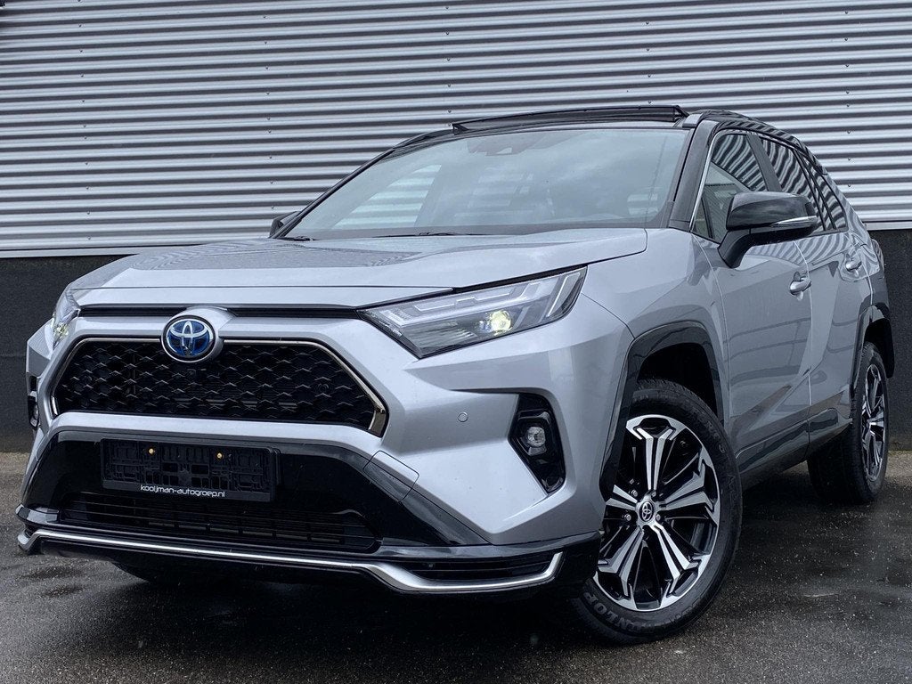 Toyota RAV4 2.5 Plug-in Hybrid AWD Bi-Tone Plus Schuif/kante, Auto's, Toyota, Automaat, Gebruikt, Euro 6, 4 cilinders