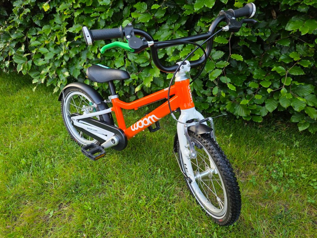 Woom 2 Kinderfiets 2024 Oranje - Topconditie, Fietsen en Brommers, Ophalen, Gebruikt, Velgrem, Minder dan 16 inch