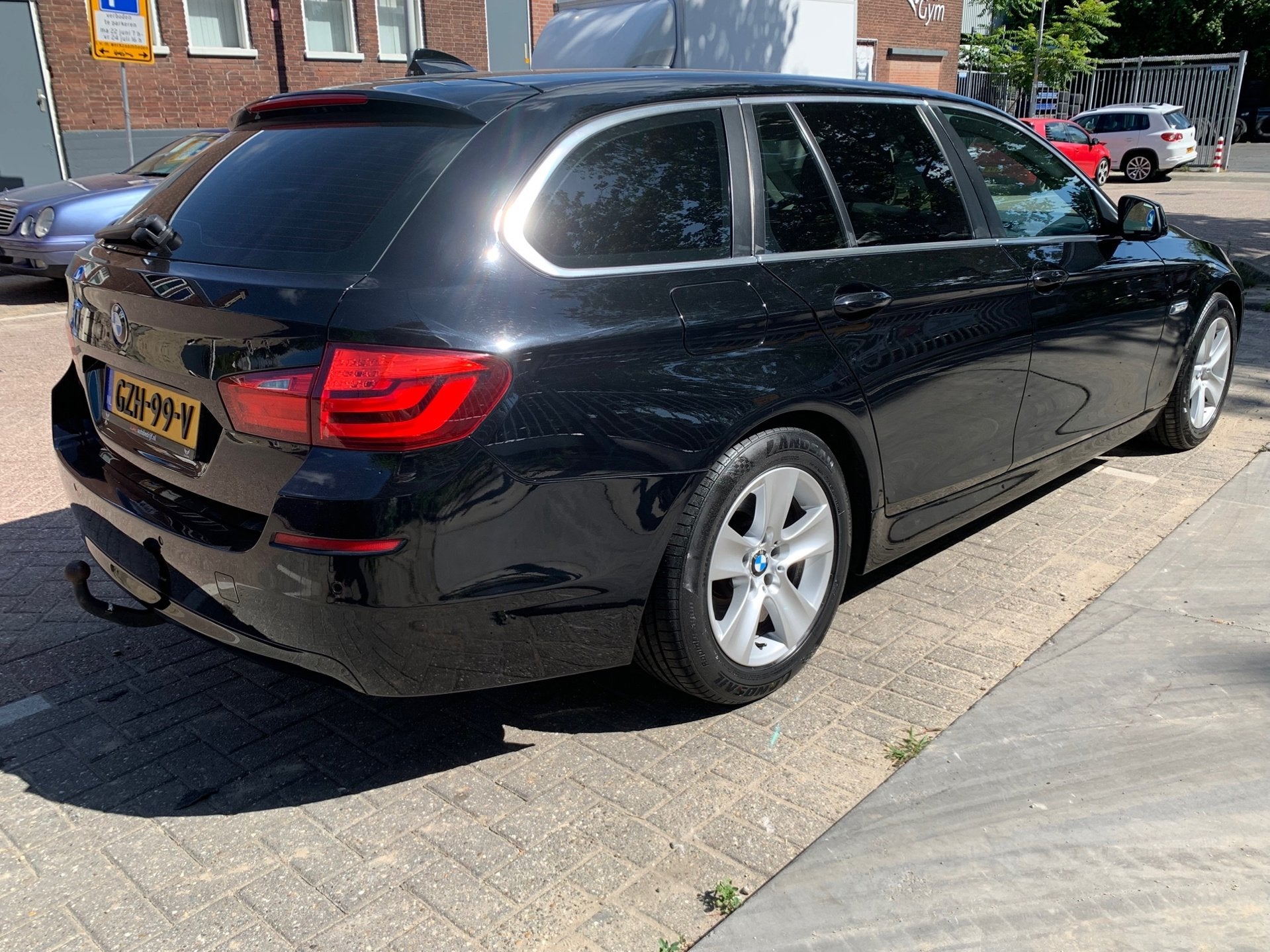 BMW 5-serie Touring 523i High Executive|Navigatie|Climate Co, Auto's, BMW, 13 km/l, Euro 5, Gebruikt, Zwart