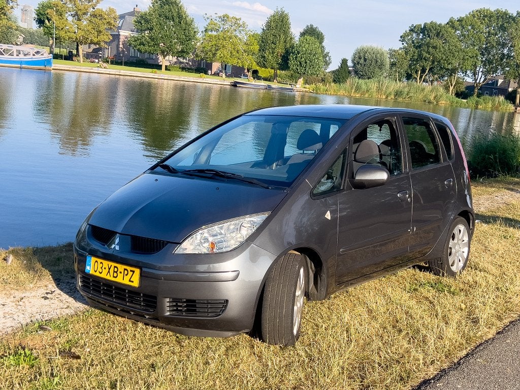 Mitsubishi Colt 1.3 Invite (2007) – Automaat – Zeer lage km!, Stof, 31 €/maand, Colt, Origineel Nederlands