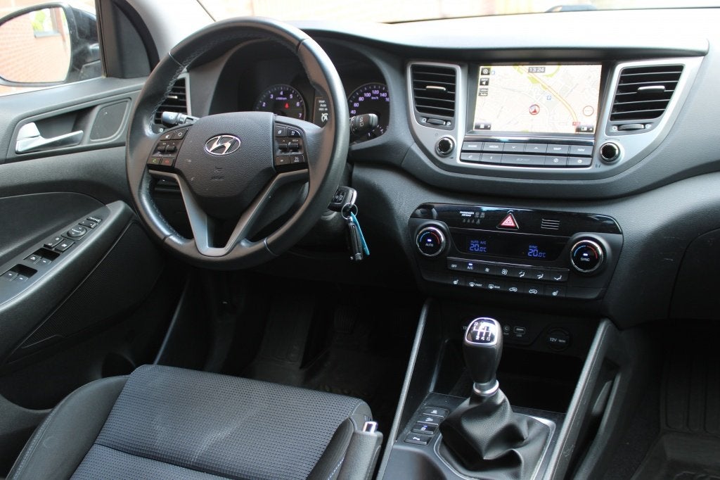 Hyundai Tucson 1.6 GDi Comfort | Navi | Camera | Stoelverwar, Auto's, Voorwielaandrijving, Stof, Gebruikt, 4 cilinders