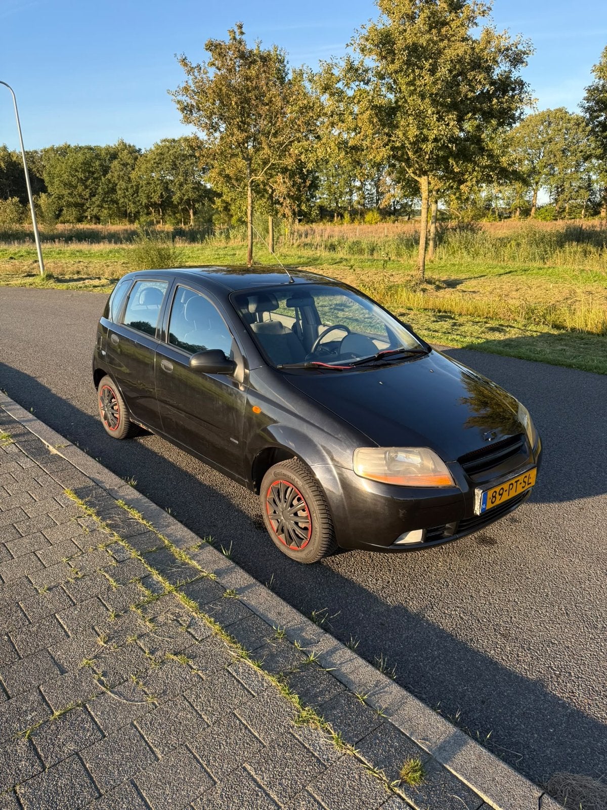 Daewoo/Chevrolet Kalos 1.2 2004 Zwart, Auto's, Voorwielaandrijving, 1150 cc, 31 €/maand, 4 cilinders