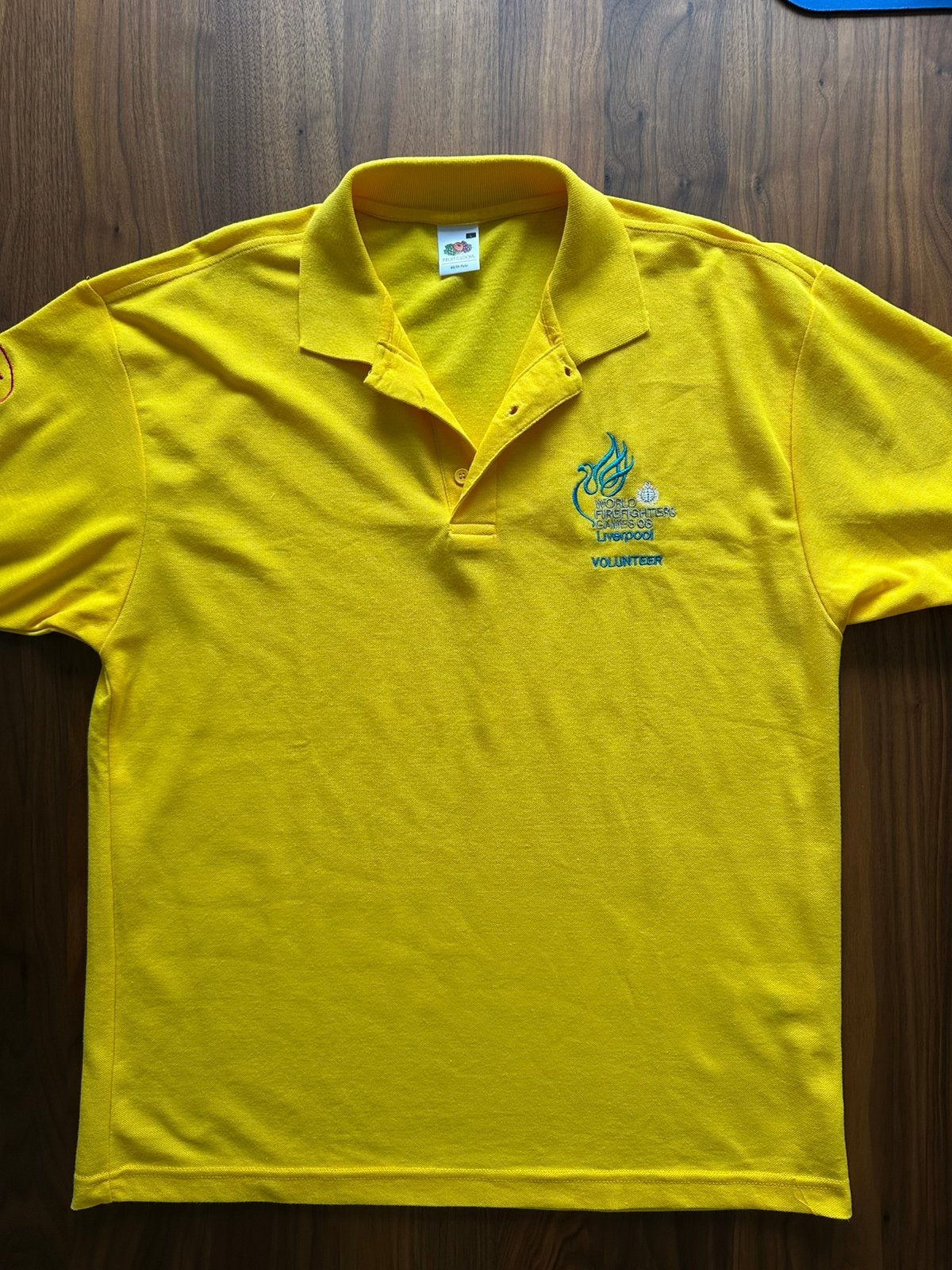 Liverpool brandweer games promotie polo shirt 2008, Ophalen of Verzenden, Nieuw, Maat 52/54 (L), Geel