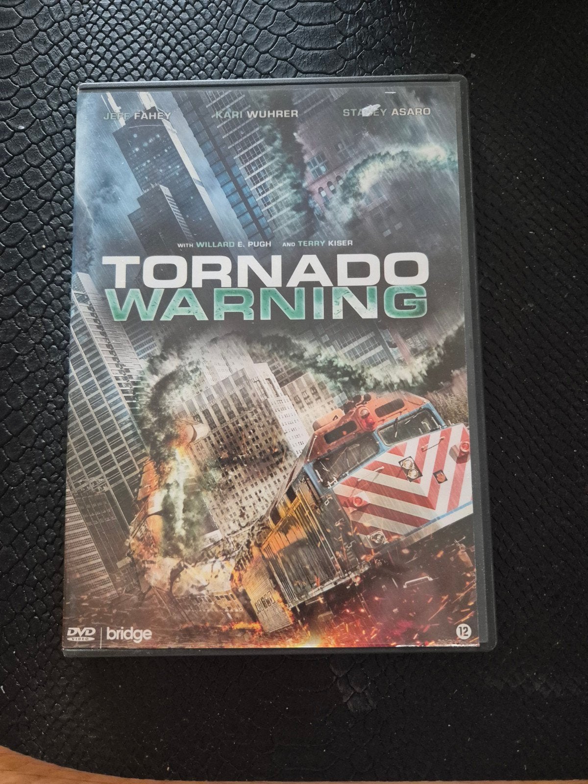 Tornado warning, Vanaf 12 jaar, Ophalen of Verzenden, Zo goed als nieuw