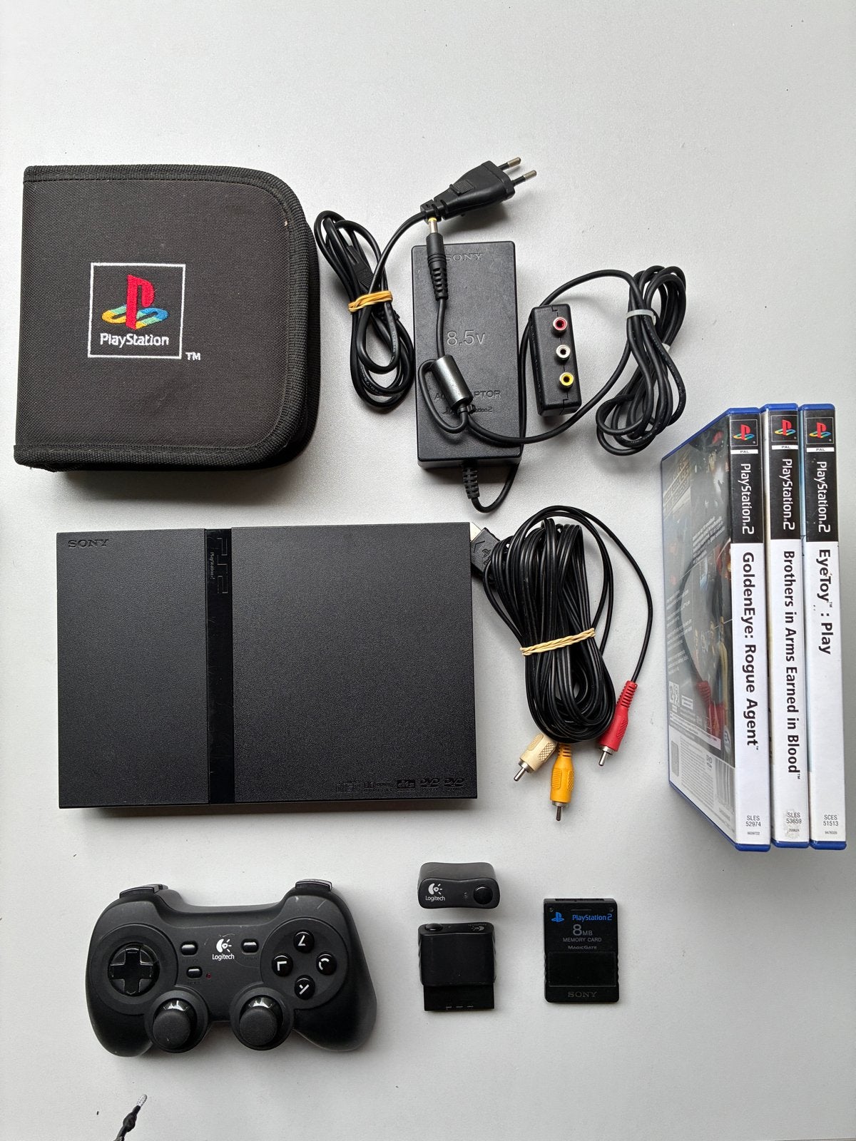 PlayStation 2 Slim SCPH-77004 met controller en games, Ophalen of Verzenden, Met 1 controller, Slim, Gebruikt