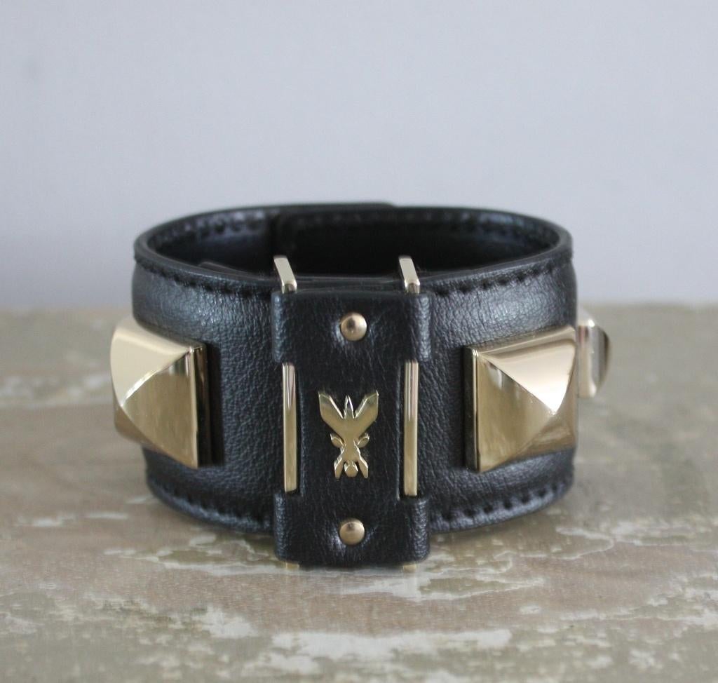 zwarte armband met goudkleurige details, Ophalen of Verzenden, Zo goed als nieuw, Zwart, Zilver