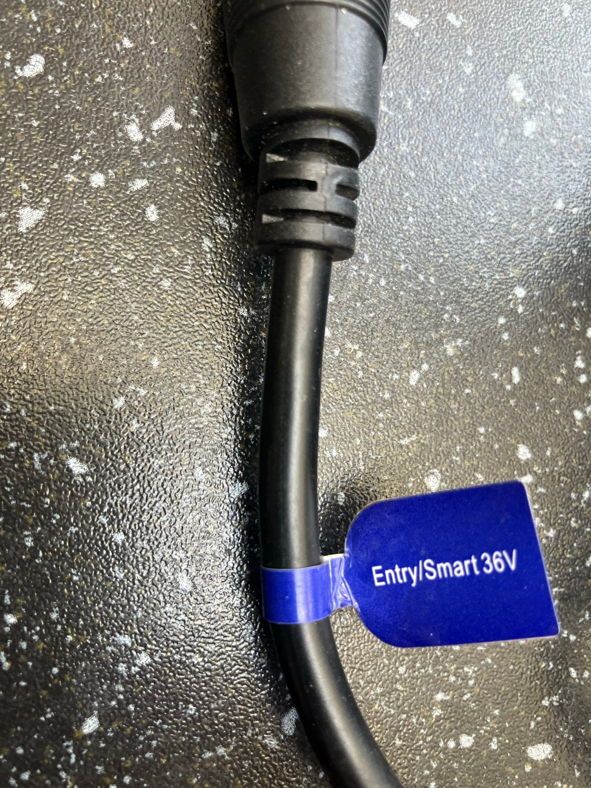 E-motion Li-ion acculader 36V voor Sparta e-bike, Ophalen of Verzenden, Gebruikt