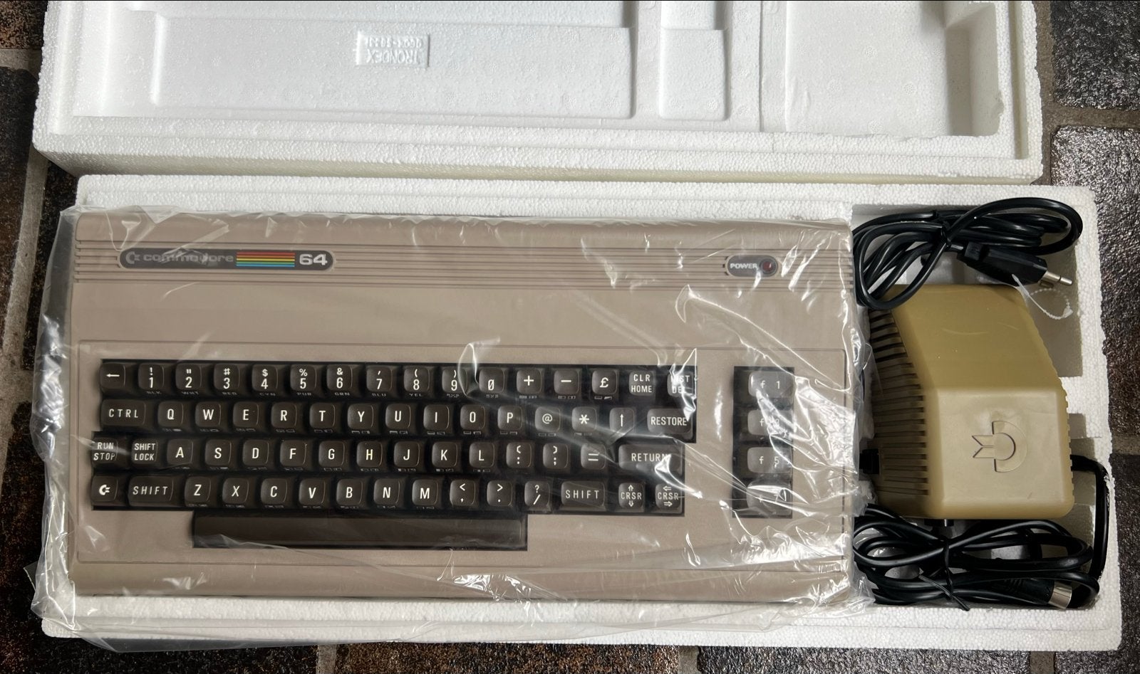Commodore 64 MicroComputer met accessoires, Ophalen