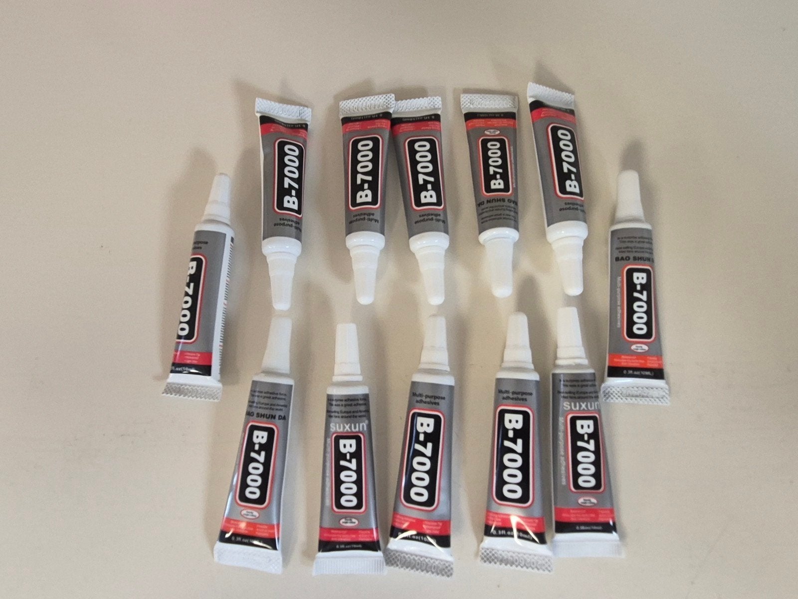 B7000 Lijm 10ml Tubes - 12 Stuks voor Telefoon & Sieraden, Telecommunicatie, Ophalen of Verzenden, Zo goed als nieuw, Overige typen