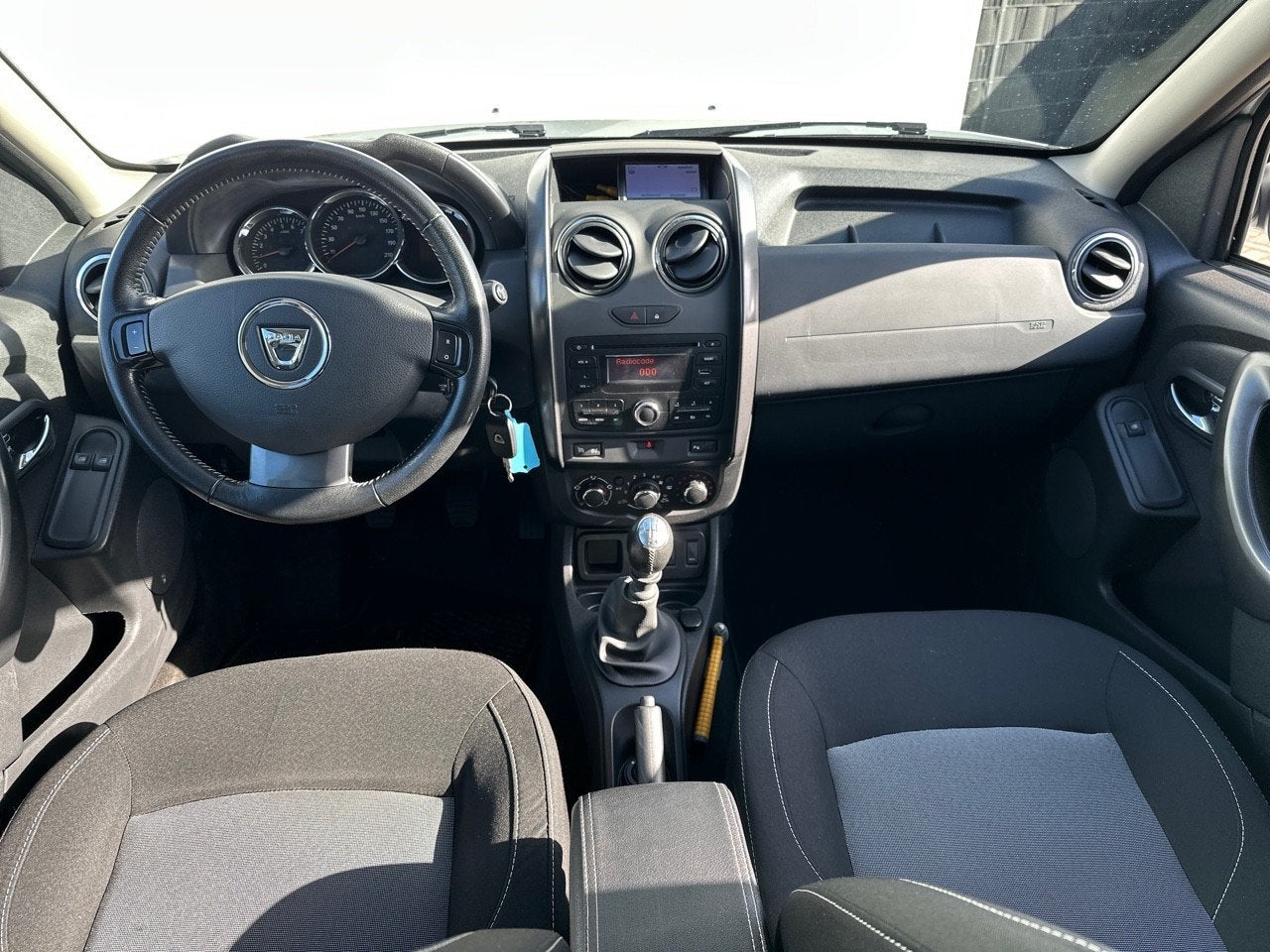 Dacia Duster 1.2 TCe 4x2 Lauréate CAMERA / TREKHAAK / CRUIS, Auto's, Gebruikt, Euro 6, Duster, 635 kg