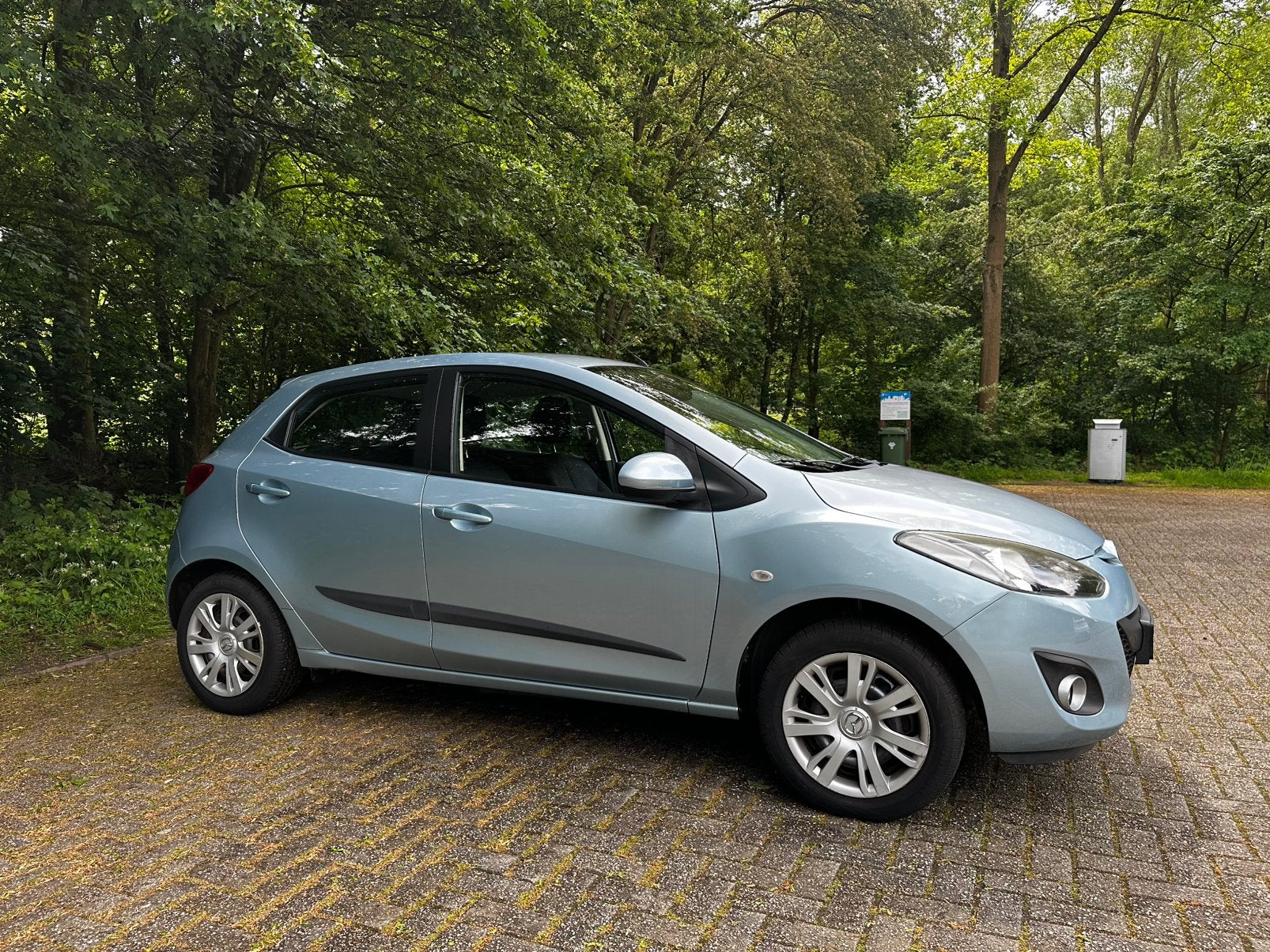 Mazda 2 1.3 75pk 5D 2011 Blauw, Auto's, Mazda, Particulier, Benzine, B, Hatchback, Handgeschakeld, Origineel Nederlands, Blauw