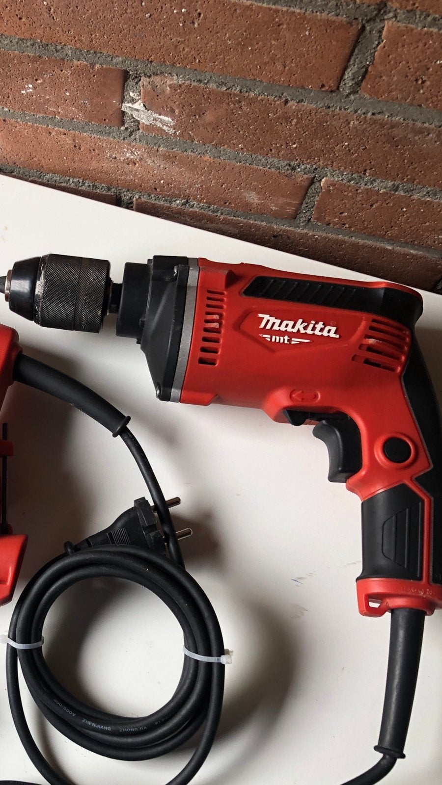 Bijna nieuw klopboormachine MAKITA, Ophalen of Verzenden, Zo goed als nieuw, Boormachine