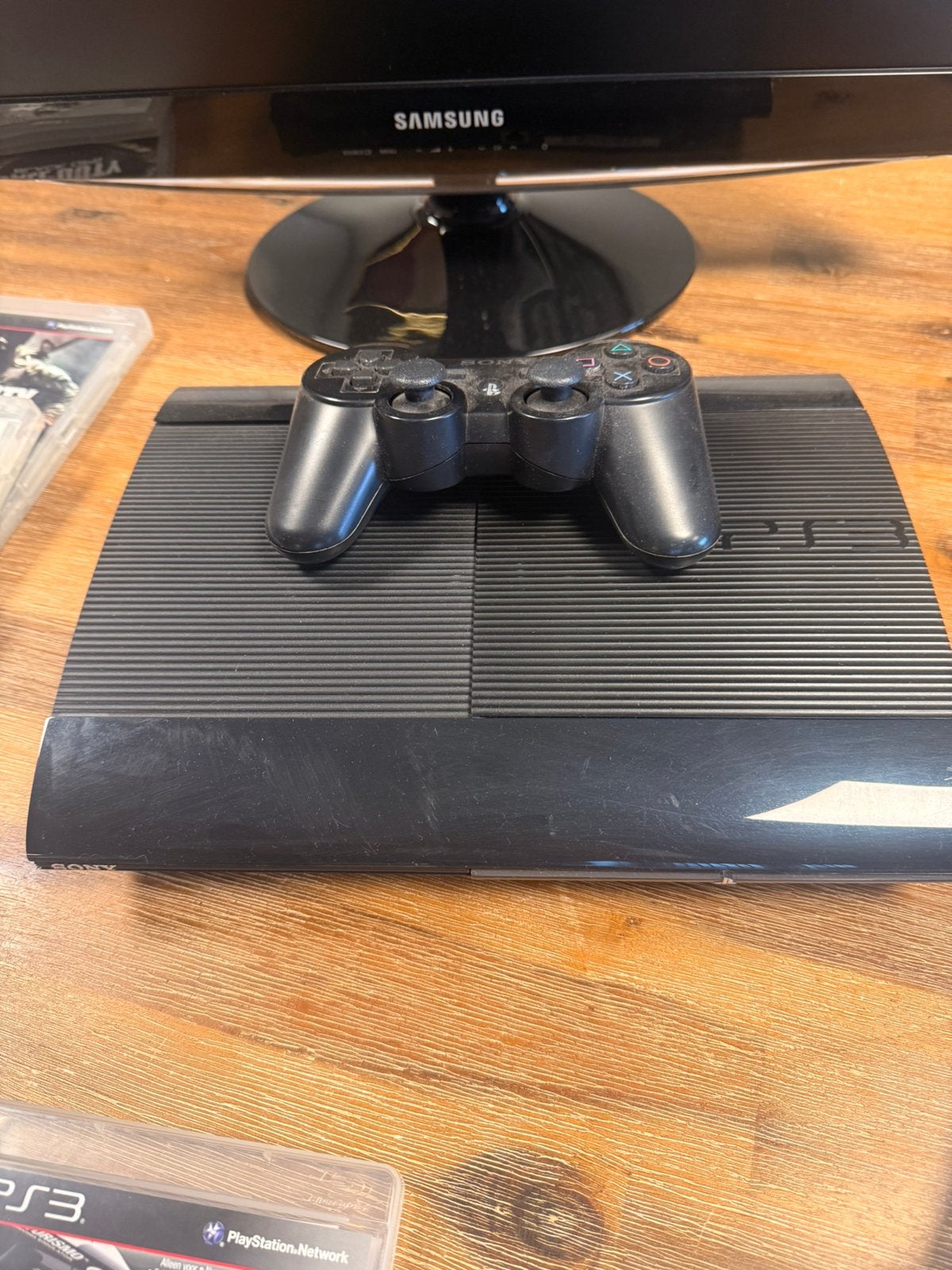 Sony PlayStation 3 met Samsung monitor en 20 spelen, Spelcomputers en Games, Ophalen of Verzenden, Zo goed als nieuw, Met 1 controller