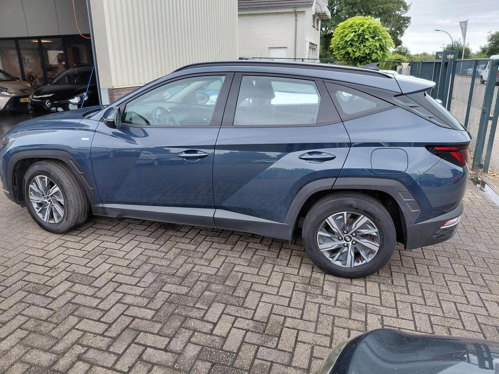 Hyundai Tucson Hybride Automaat, Auto's, 136 pk, Gebruikt, Blauw, 1650 kg