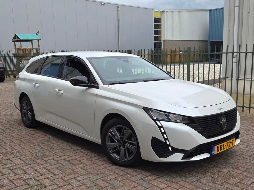 Peugeot 308 SW 1.2 PureTech 130pk Allure Nieuwstaat!, 1199 cc, Met garantie (alle), Leder en Stof, Wit