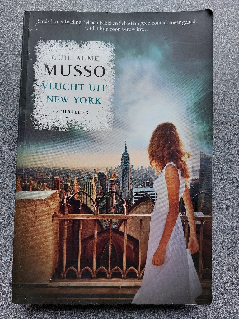 'Guillaume Musso - Vlucht uit New York, Ophalen of Verzenden, Zo goed als nieuw
