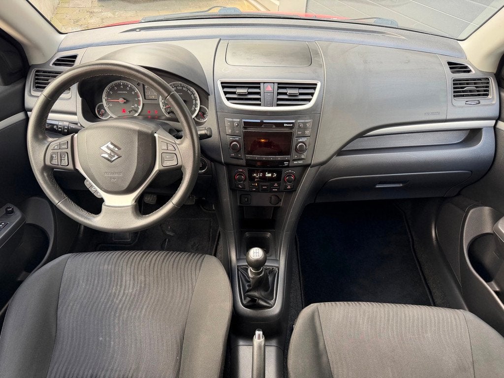 Suzuki Swift 1.2 Exclusive EASSS / Clima / Cruise / 5DRS / N, Auto's, Suzuki, Voorwielaandrijving, Gebruikt, 4 cilinders, Met garantie (alle)
