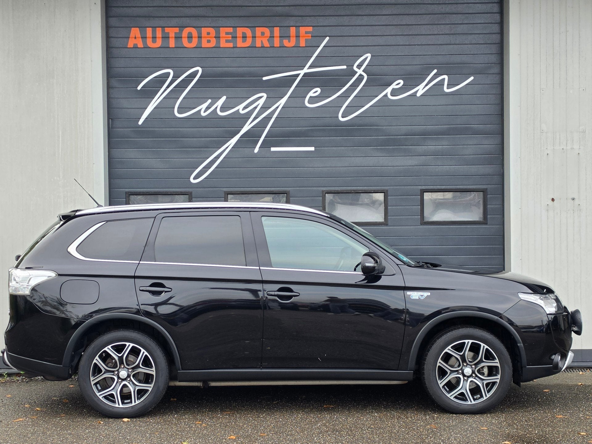 Mitsubishi Outlander 2.0 PHEV Executive Edition X-Line|Trekh, Auto's, Zwart, 4 cilinders, Leder en Stof, Zwart