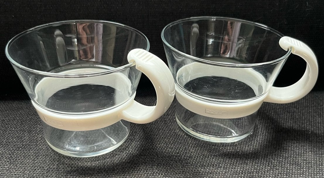 2 Vintage Bodum Glazen Kopjes met witte kunststof houder, Ophalen of Verzenden