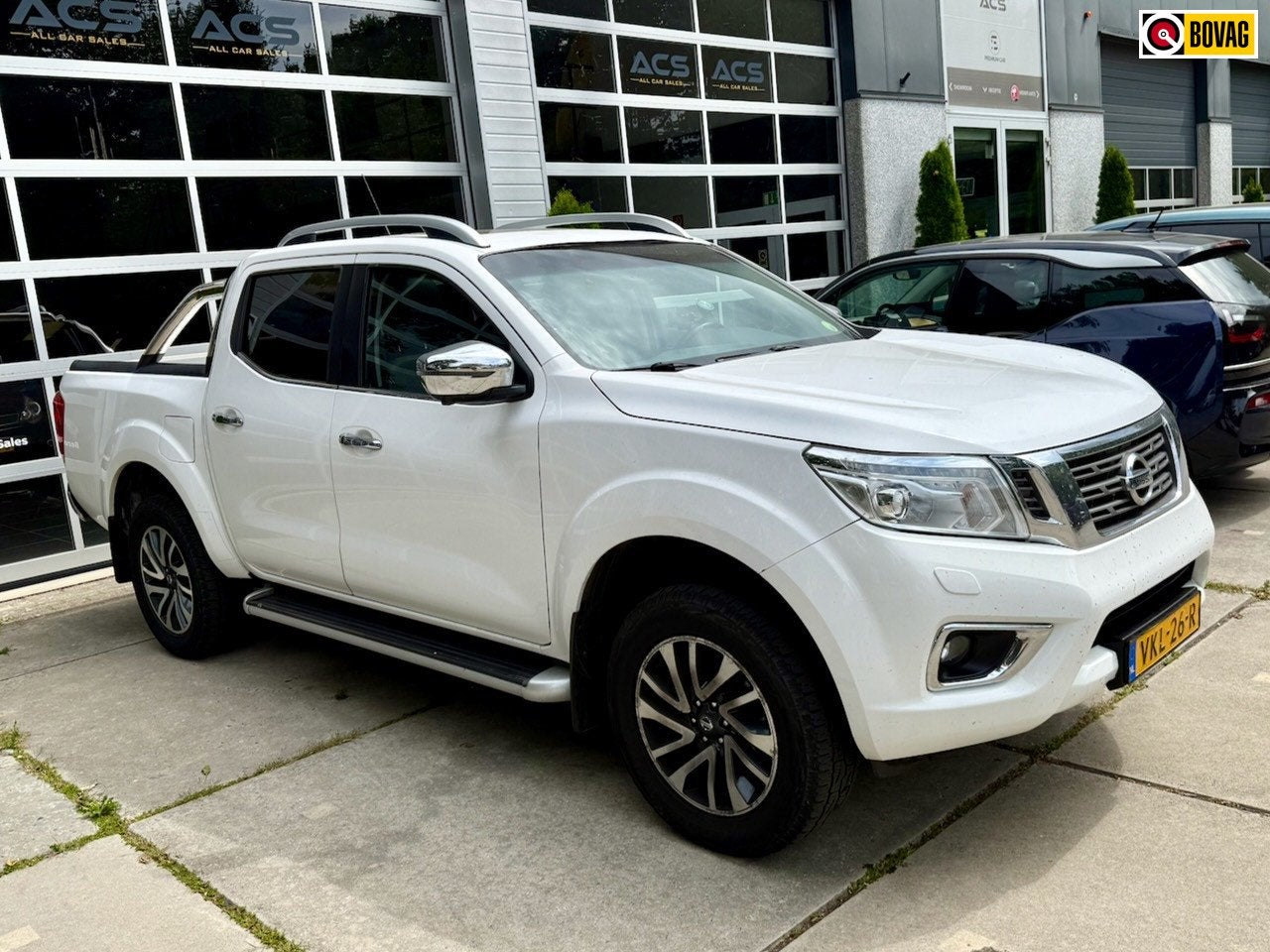 Nissan Navara 2.3 dCi Tekna DC (5-zitplaatsen) Snoeks, Automaat, Gebruikt, Wit, Bedrijf
