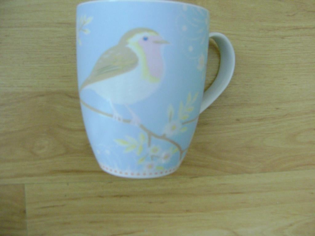 Mok PIP Home lichtblauw met vogel en bloemen, Huis en Inrichting, Keuken | Servies, Gebruikt, Ophalen of Verzenden, Overige stijlen
