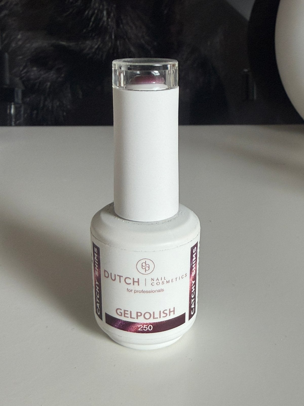 Dutch Nail Cosmetics Cat Eye Gel Polish 250 – Roze/Paarse, Ophalen of Verzenden, Gebruikt, Roze, Handen en Nagels