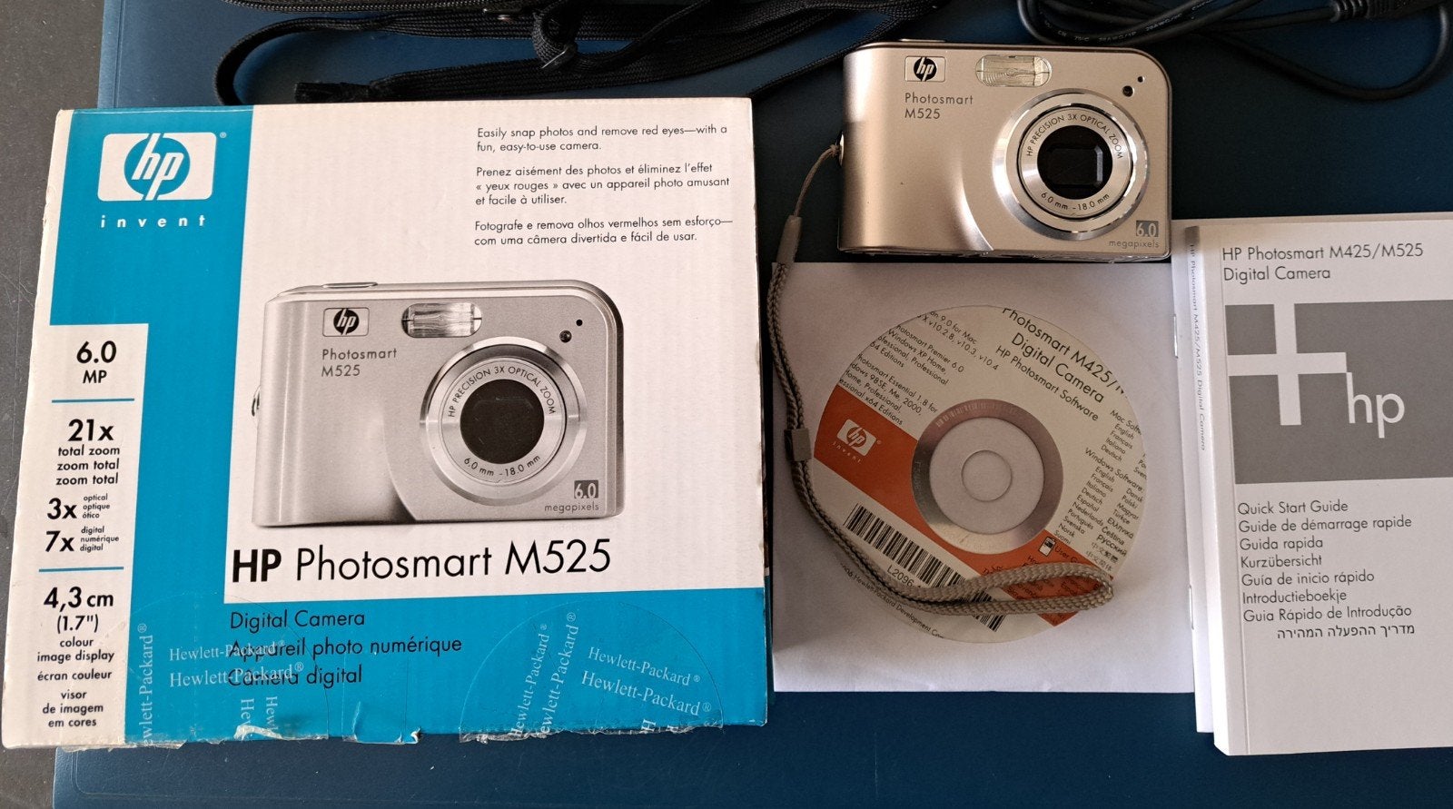 HP M525 digitale compact fotocamera, Audio, Tv en Foto, Ophalen of Verzenden, 4 t/m 7 keer, Gebruikt, Handleiding