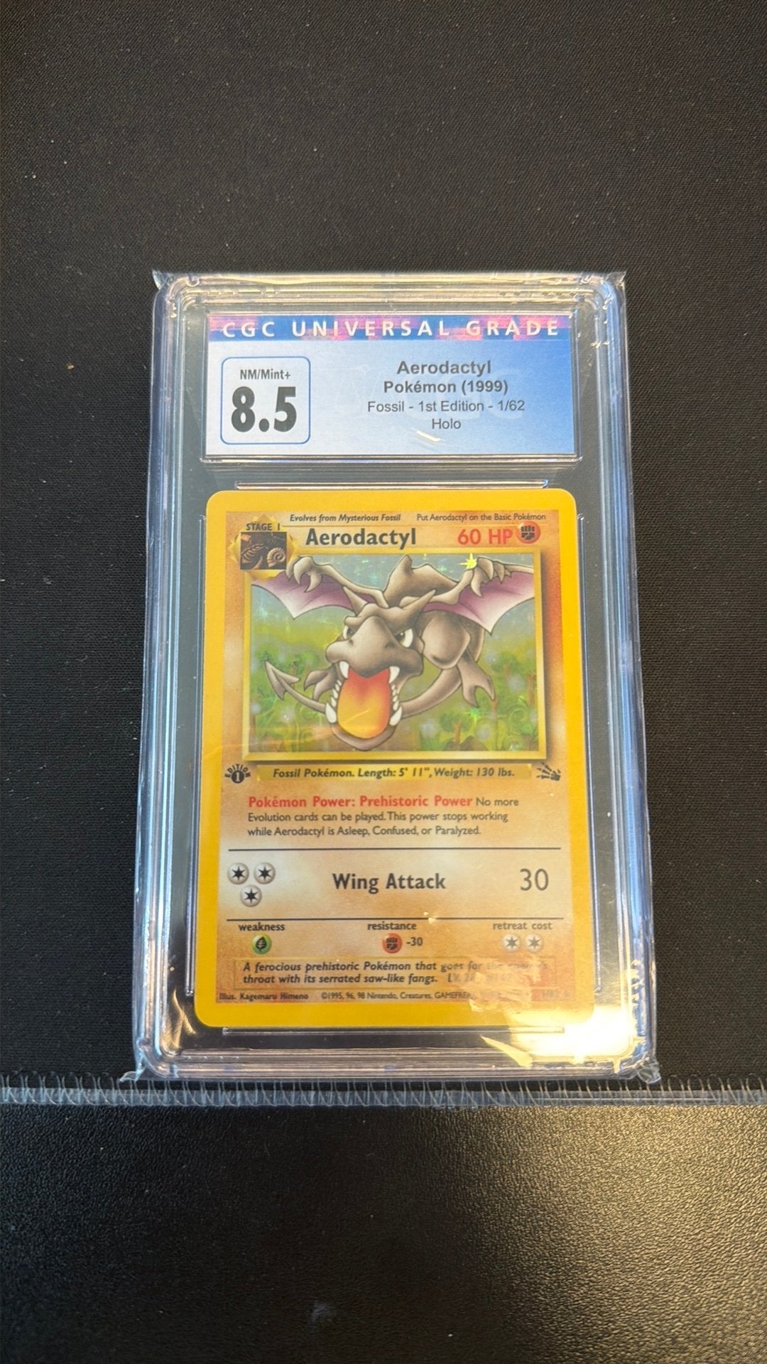 Aerodactyl Holo 1st edition #1 CGC 8.5, Ophalen of Verzenden, Zo goed als nieuw