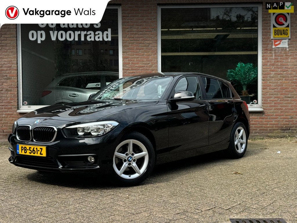 BMW 1-serie 118i Corporate Lease | Navi | Automaat | Cruise, Auto's, BMW, 12 maanden, Gebruikt, Zwart, Bedrijf