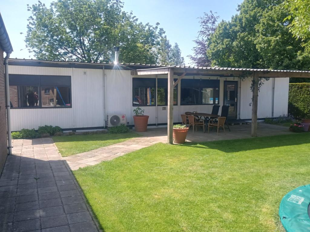 Woonunit 92m2 incl. overkapping (gasloos), 4 slaapkamers, Zakelijke goederen, Ophalen