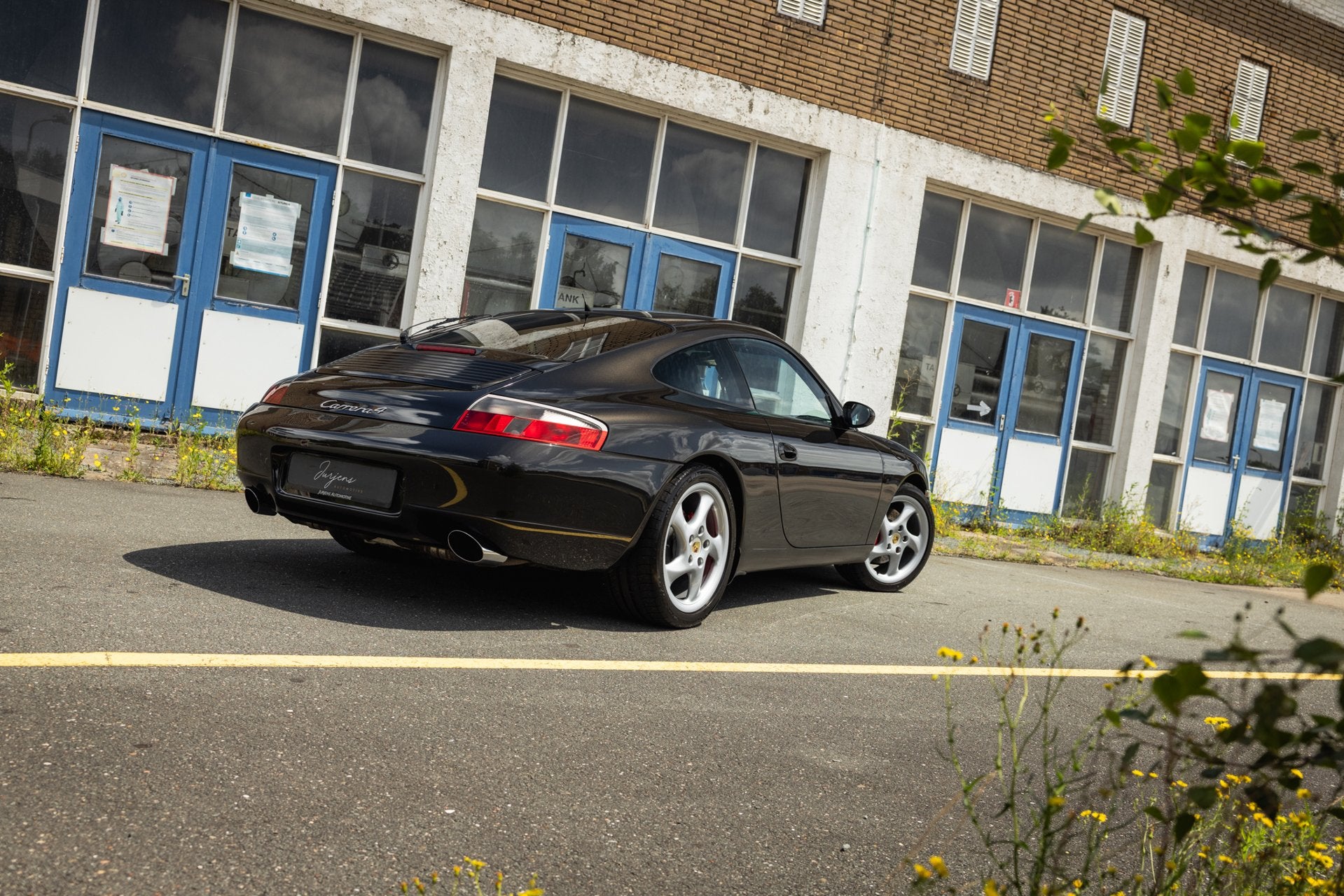 Porsche 911 3.4 Coupé Carrera 4 Manual (300pk) Xenon 18" 10, Auto's, Euro 2, Gebruikt, Zwart, 1350 kg