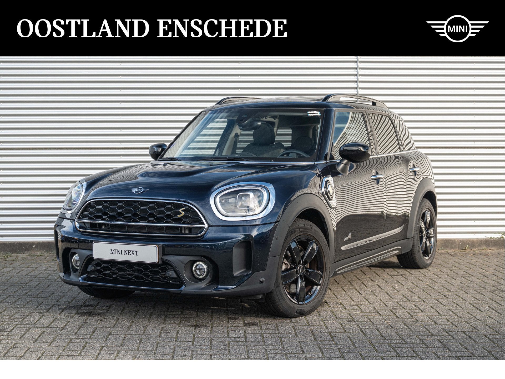 MINI Countryman Cooper S E ALL4 Automaat / Panoramadak / Com, Auto's, Automaat, Dealer onderhouden, Gebruikt, Countryman