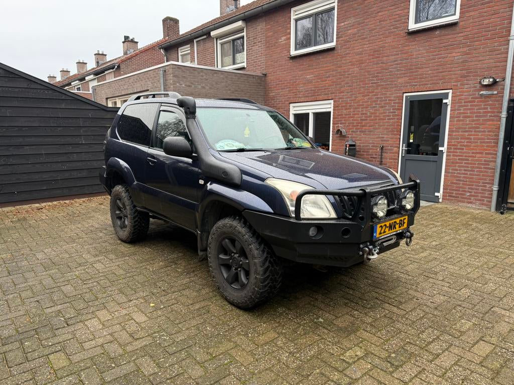 Toyota Landcruiser 3.0 D-4d 3DR VX AUT 2004 Blauw, Auto's, Automaat, 4 cilinders, 241 €/maand, Blauw