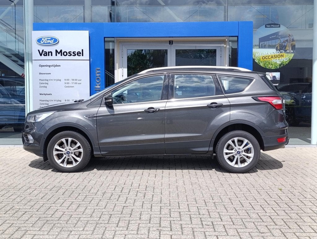 Ford Kuga 1.5 EcoBoost Titanium | Stoel/stuur voorruitverwar, Auto's, Ford, 12 maanden, Euro 6, 4 cilinders, Leder en Stof