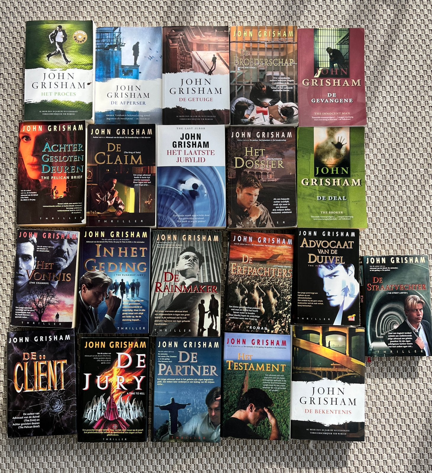 21 titels John Grisham, Ophalen of Verzenden, Zo goed als nieuw