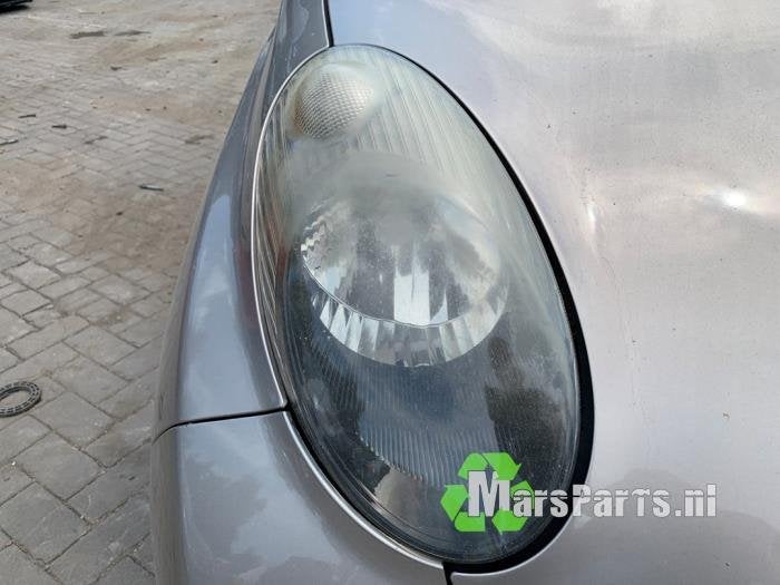 Koplamp rechts van een Nissan Micra CC, Auto-onderdelen, Gebruikt, -, -, Ophalen of Verzenden