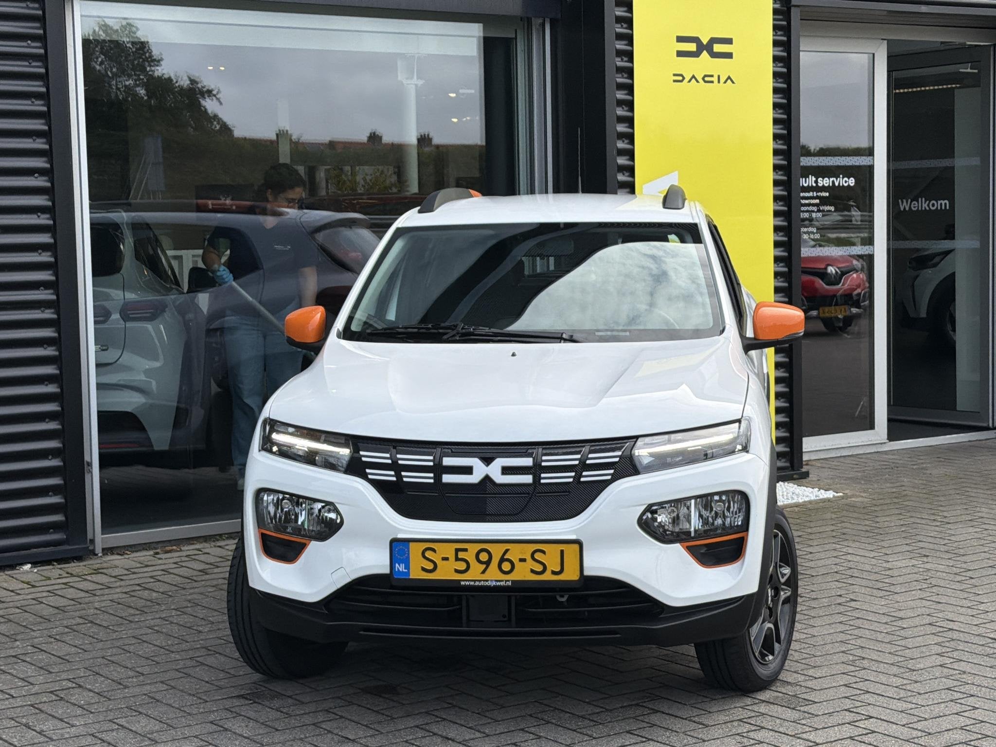 Dacia Spring Expression 27 kWh Lederen interieur, Camera, CC, Auto's, Gebruikt, Wit, Parkeersensor, Onderhoudsboekje