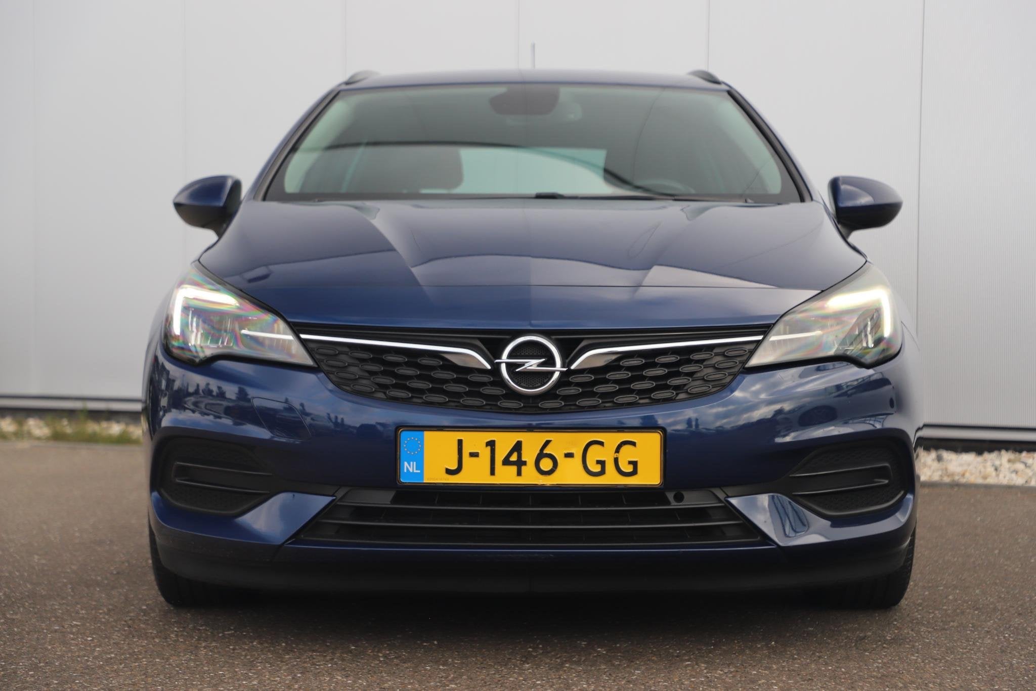 Opel Astra Sports Tourer 1.2 Edition 131PK Navigatie Carplay, Auto's, Voorwielaandrijving, Stof, 1199 cc, Met garantie (alle)