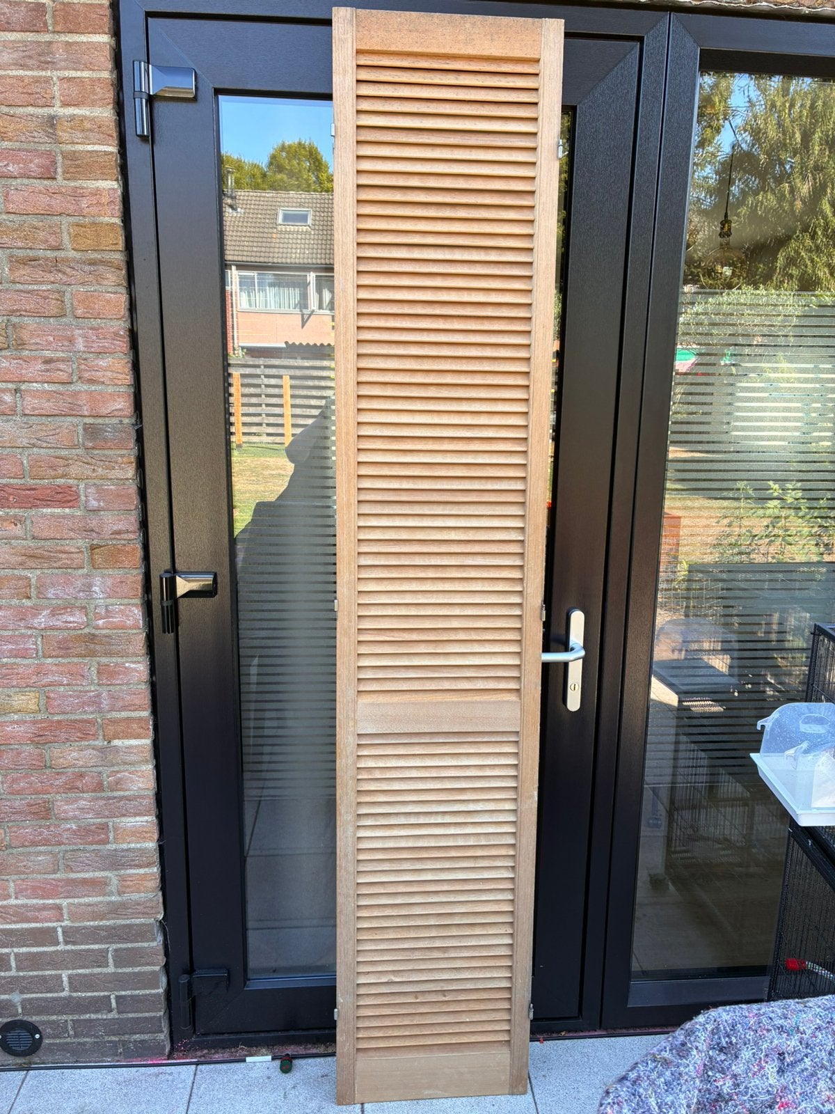 Shutter deur, Ophalen, Zo goed als nieuw