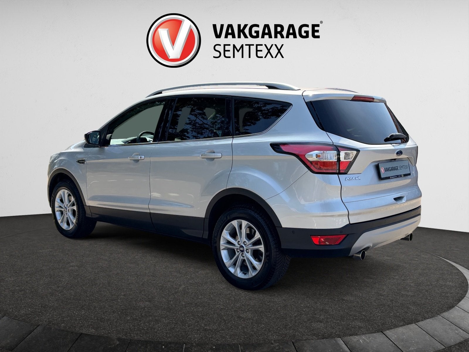 Ford Kuga 1.5 EcoBoost Titanium | Clima | Cruise | Camera |, Auto's, 4 cilinders, Leder en Stof, 14 km/l, Bedrijf