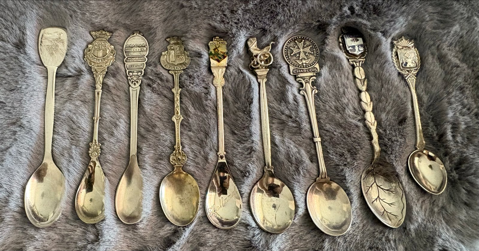Set van 9 vintage souvenirlepels uit diverse plaatsen, Ophalen of Verzenden