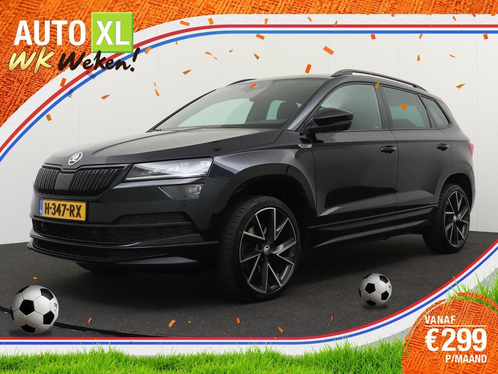 Skoda Karoq 1.5 TSI 150 PK Aut. Sportline Adap.Cruise 19'LMV, Auto's, Skoda, Stof, 4 cilinders, 150 pk, Zwart