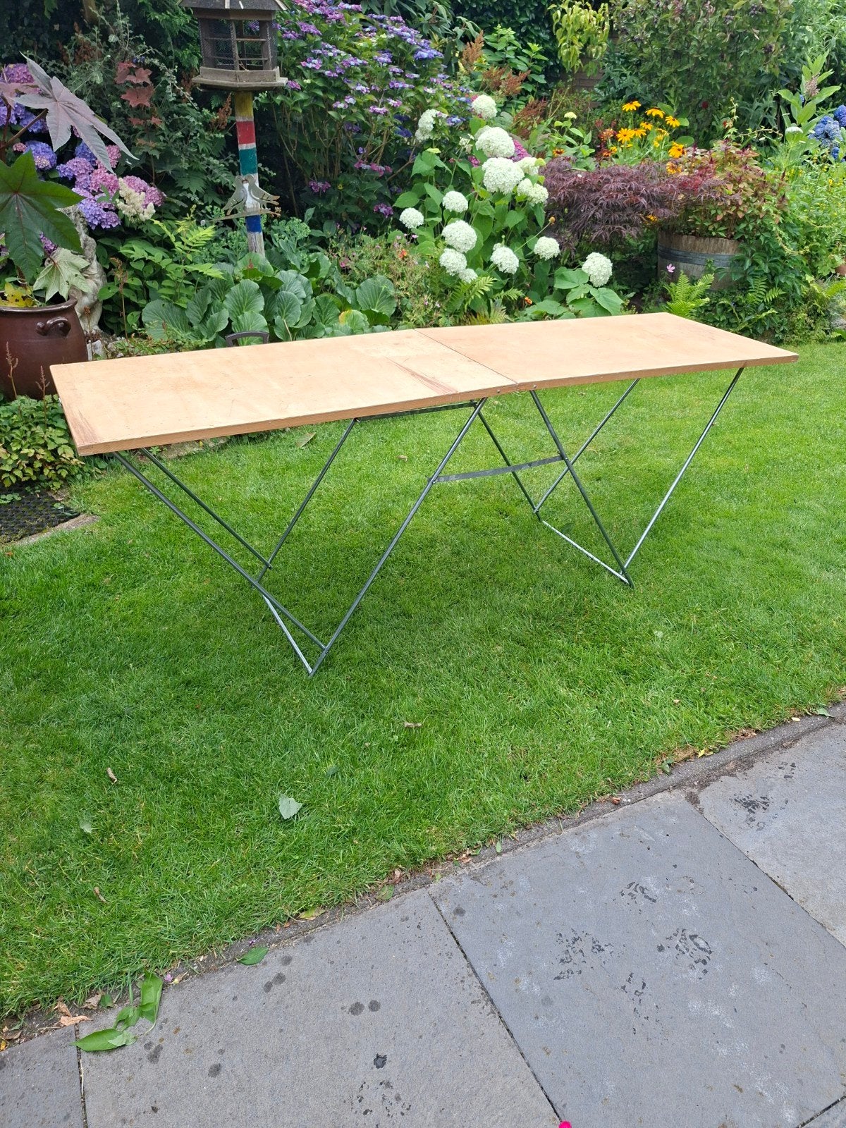 Mooie inklapbare behangtafel, Ophalen